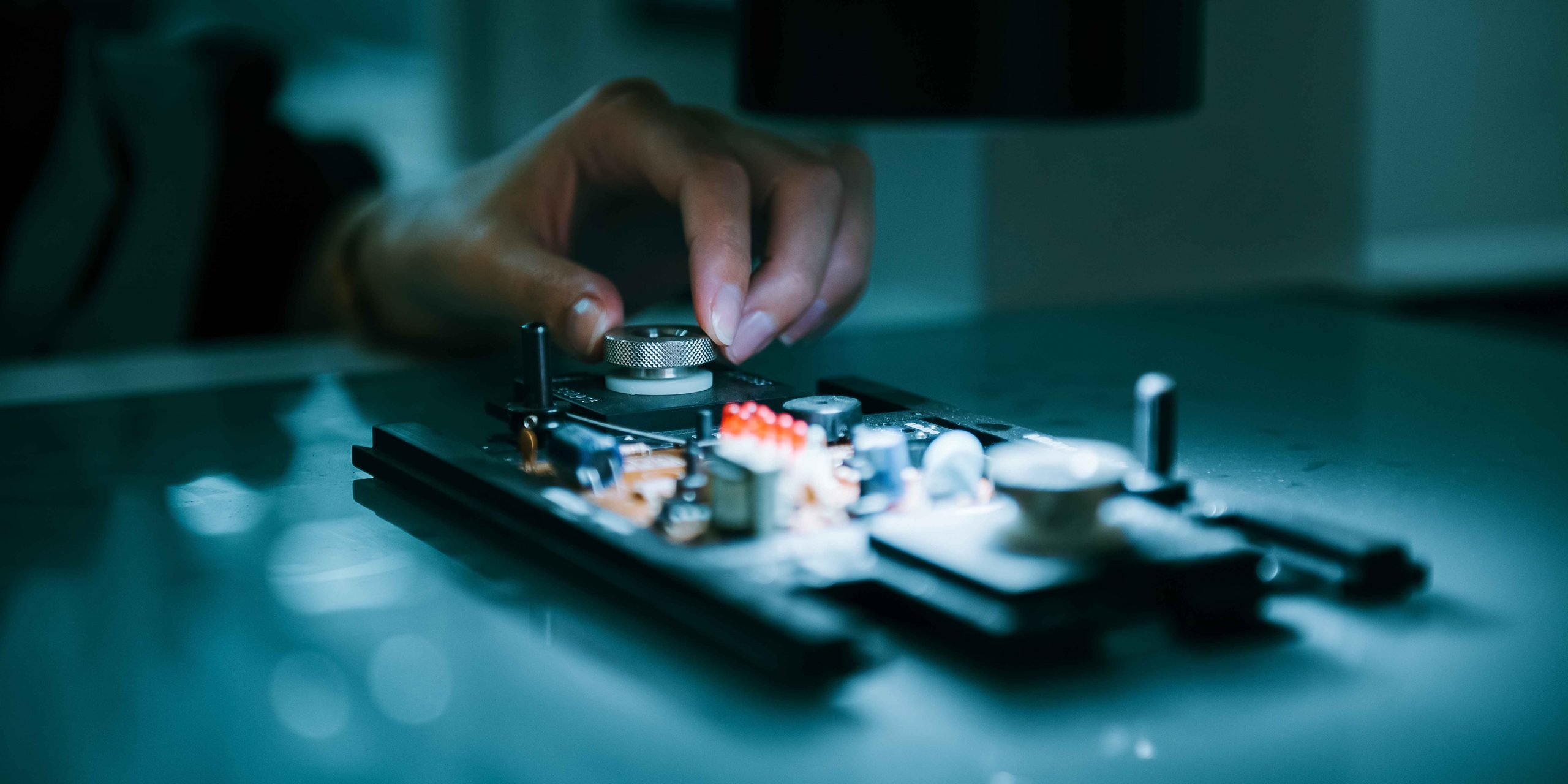 Technician working on an electronics assembly at NOTE in the UK
