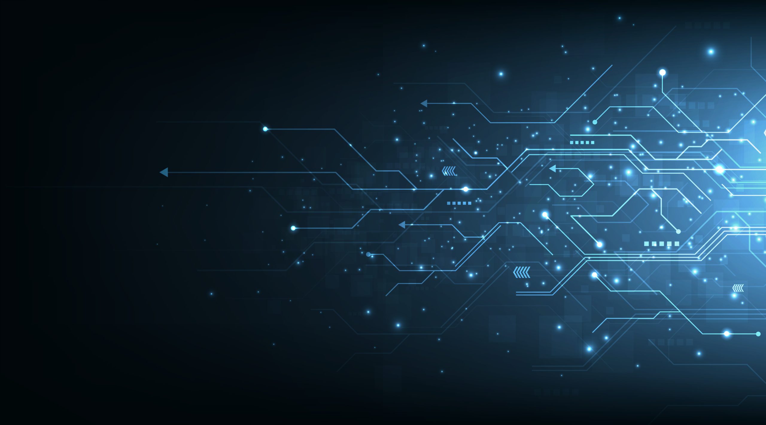 Glowing blue circuit board traces on a dark background